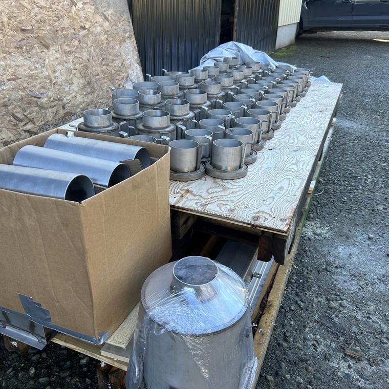 Stainless steel P-traps and cleanout bodies palletized and ready to ship